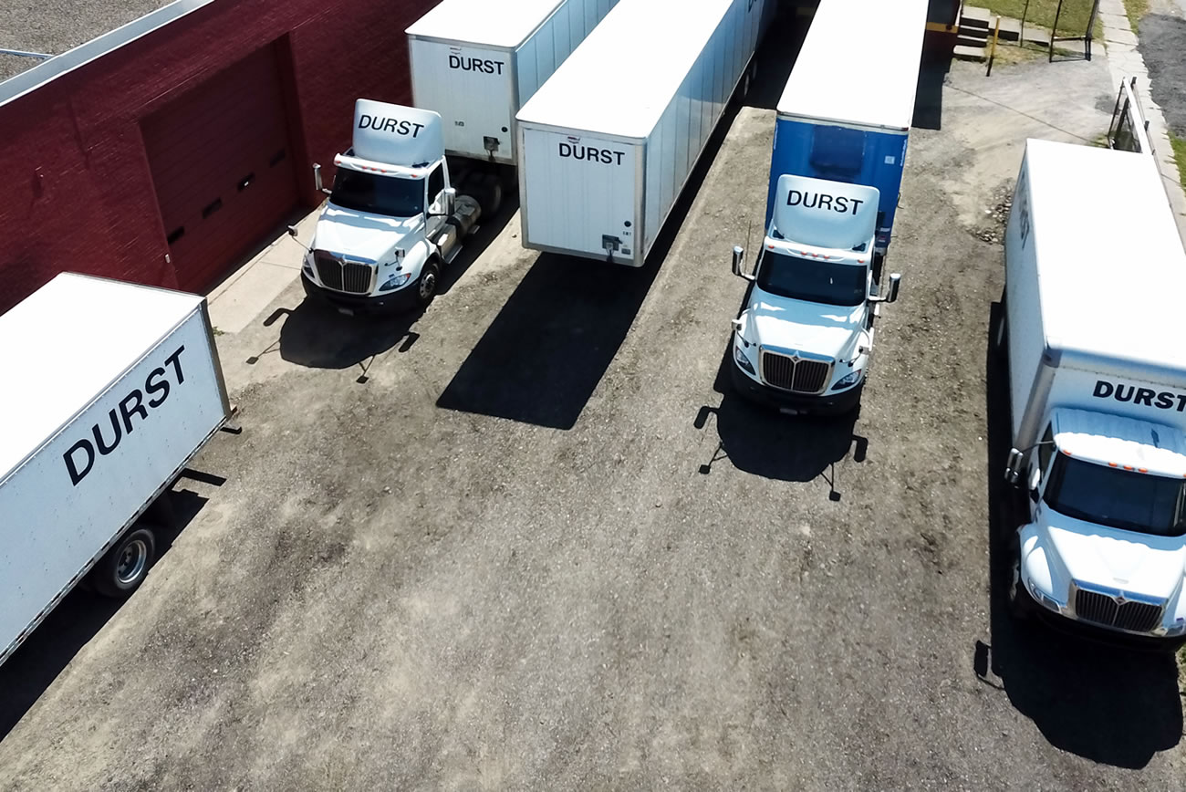 several durst trucks unloading at the warehouse in erie